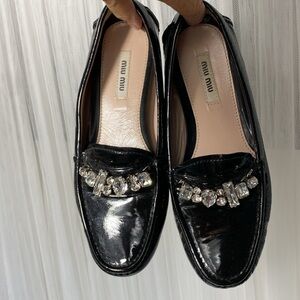 Miu Miu Black Patent Leather Loafers with Crystal Embellishments